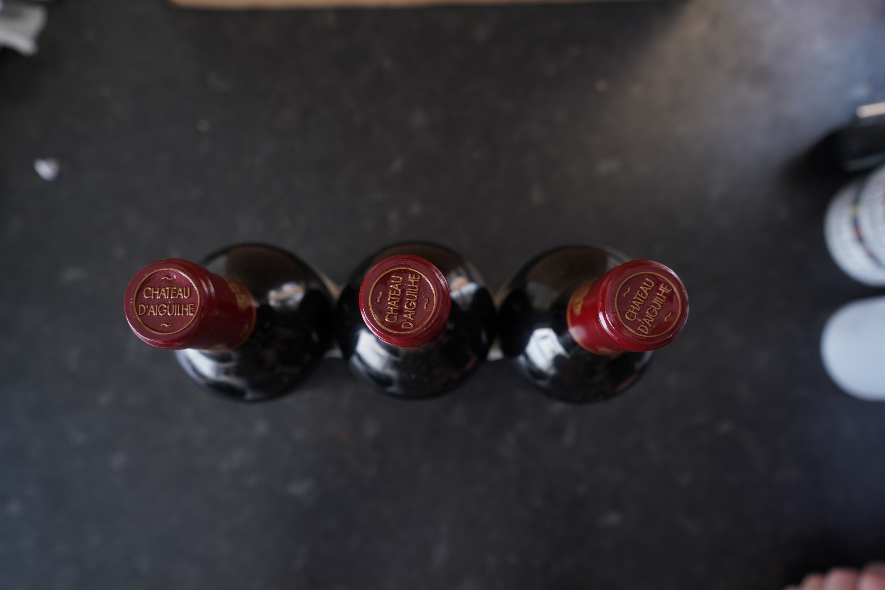 Nine bottles of 2002 Chateau d'Aiguilhe Castillon Cotes de Bordeaux, France